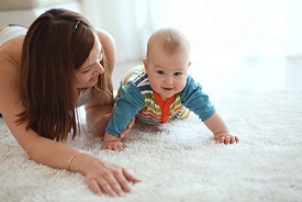 Best carpet cleaning company in Mobile, AL lets baby play on clean carpet